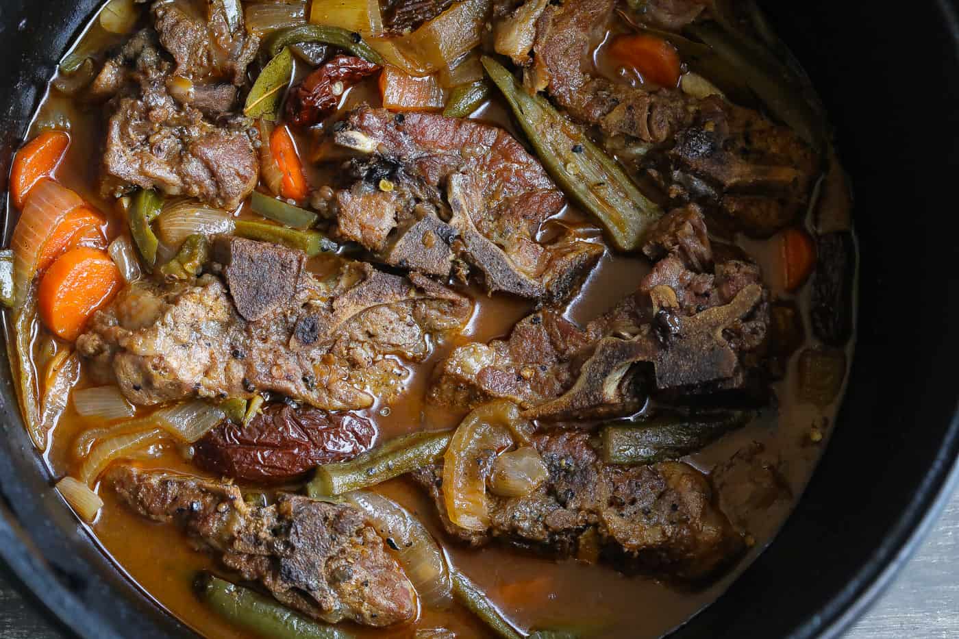 braised neck bones on a white plate