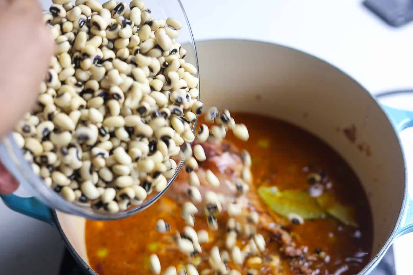 peas being added to pot