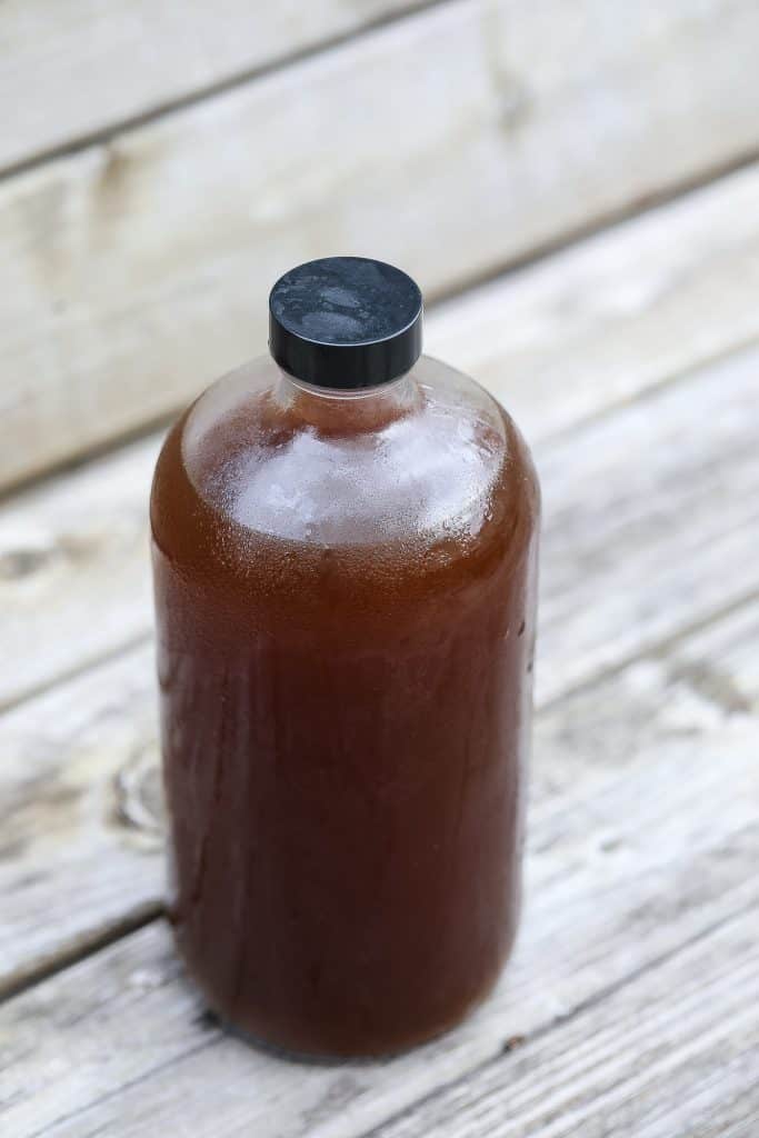 vegetable stock in a clear bottle