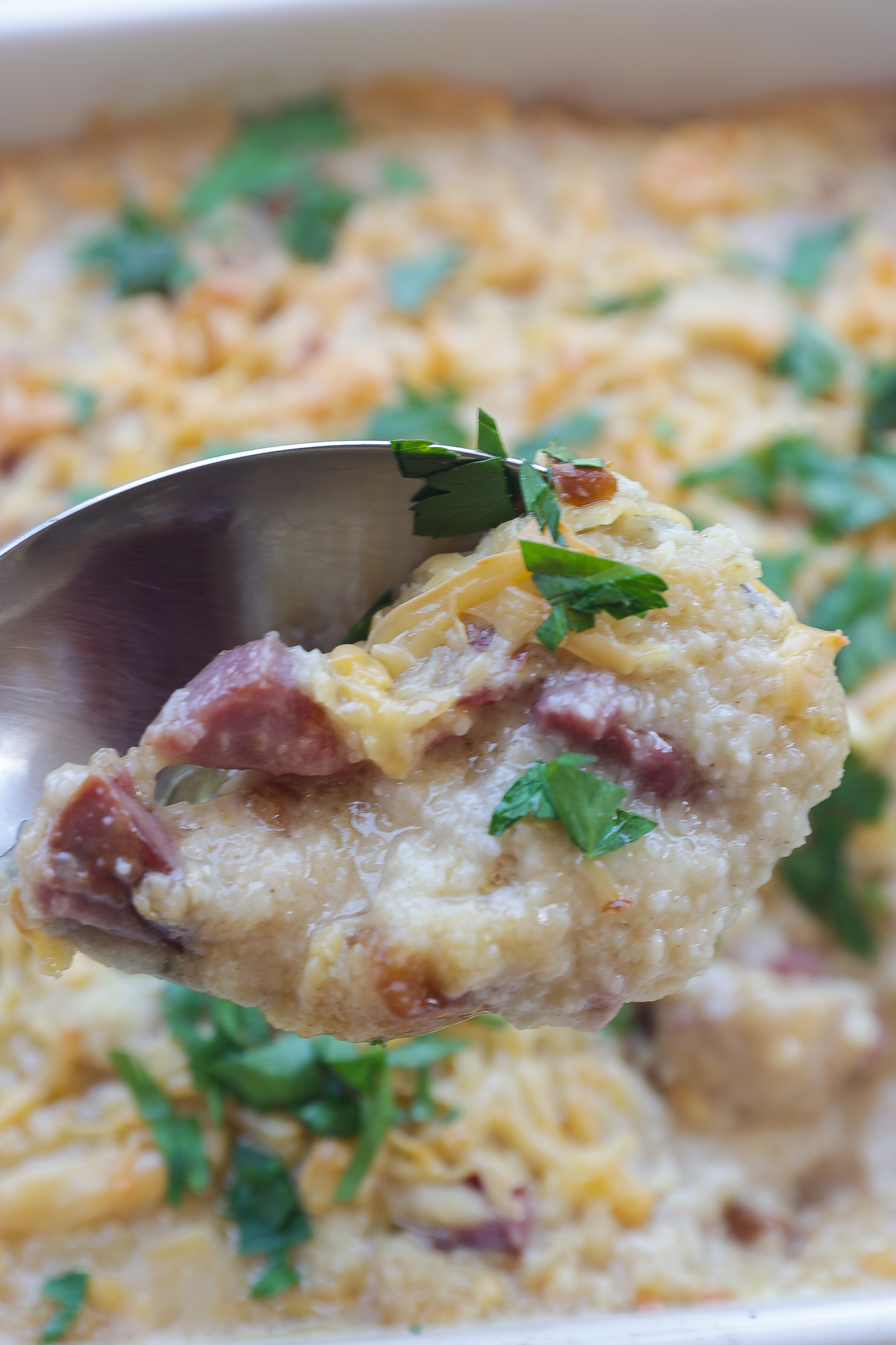 baked grits in a white pan