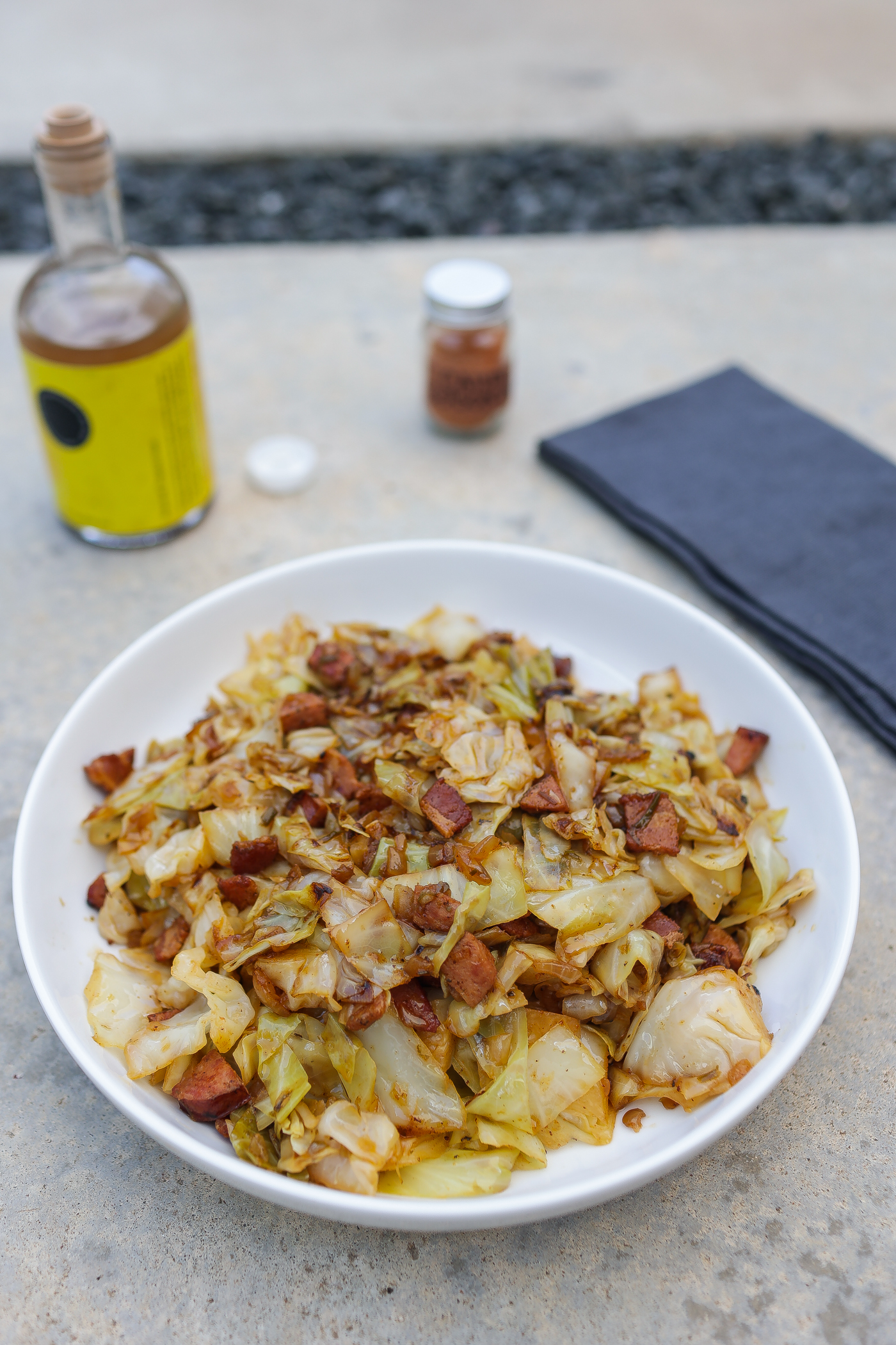 smothered cabbage in white pan