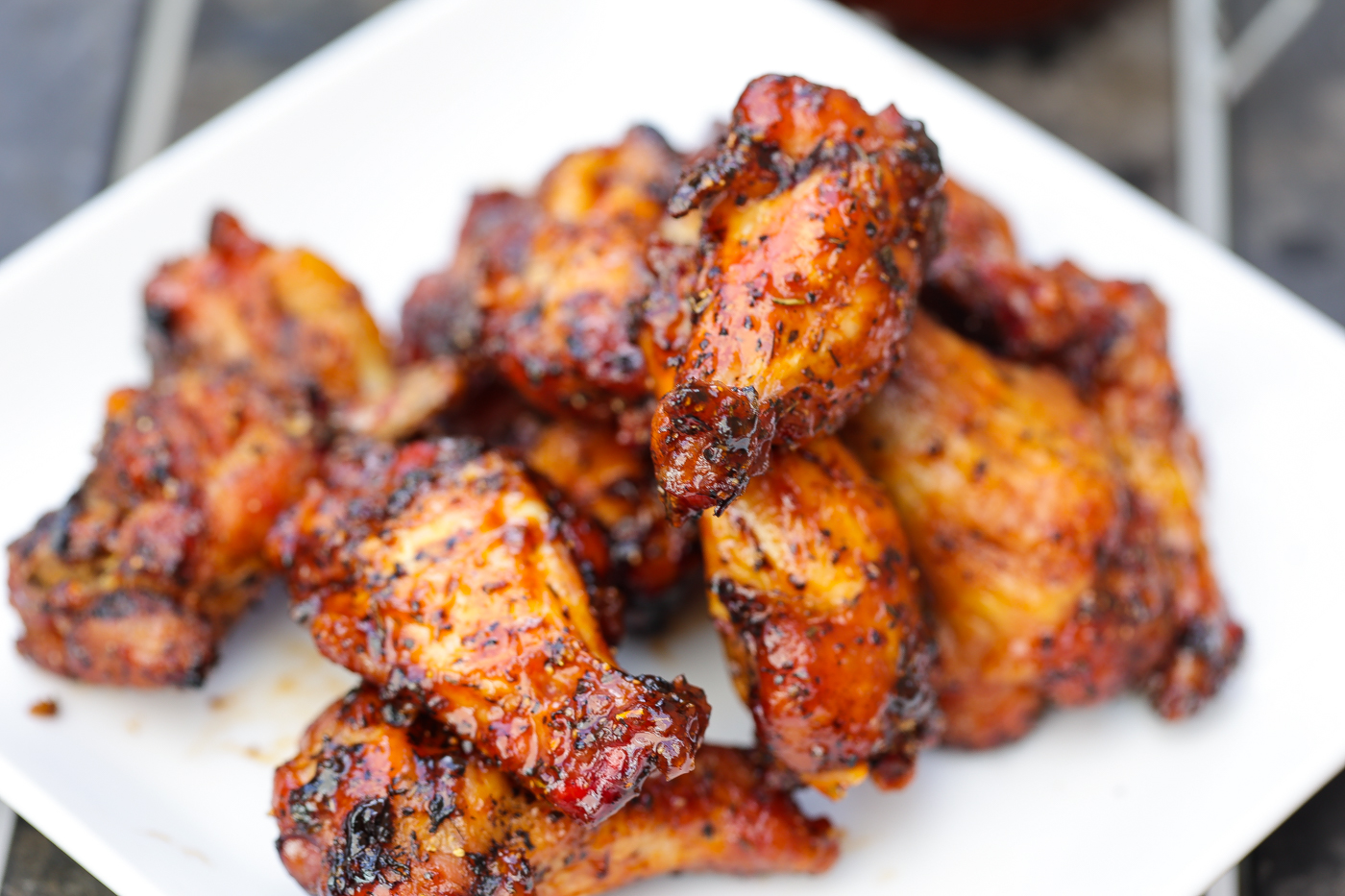 grilled chicken wings on white plate