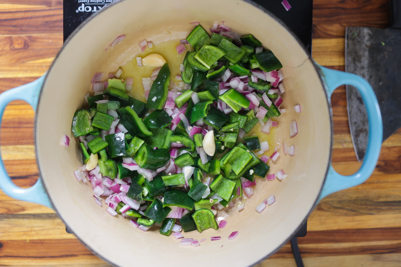 vegetables sauteing in pot