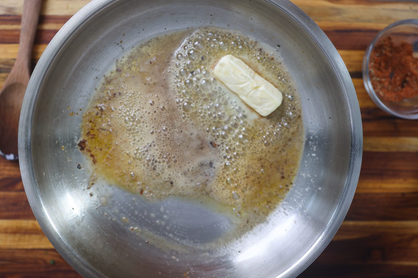 lemon garlic butter sauce cooking in skillet