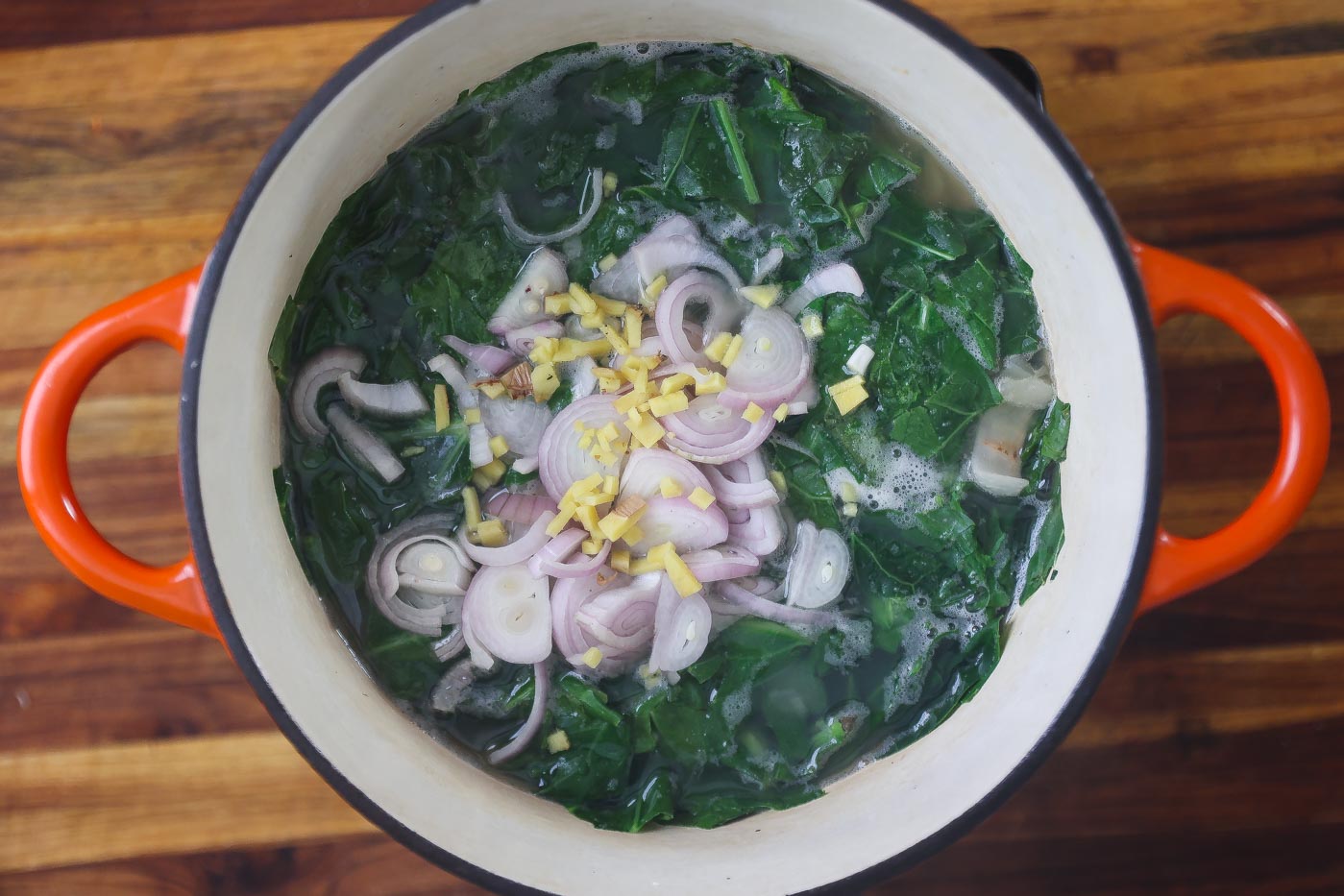 collard greens and spinach soup in a large pot