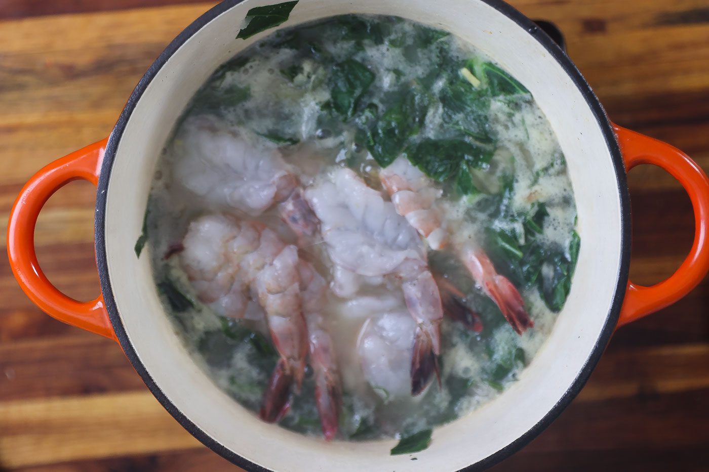 collard greens and spinach soup in a large pot