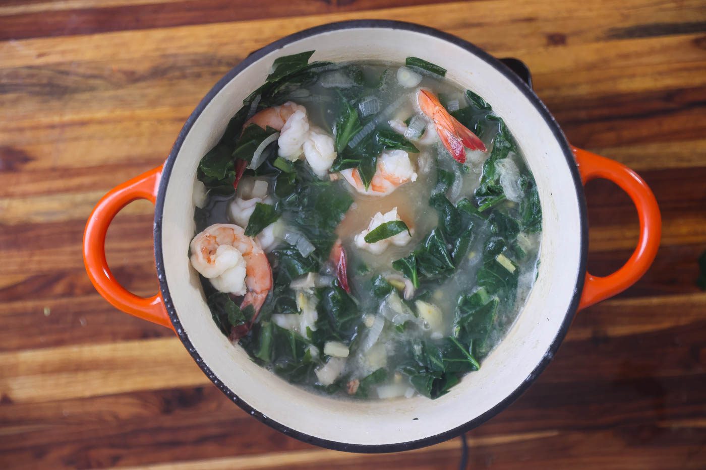 collard greens and spinach soup in a large pot